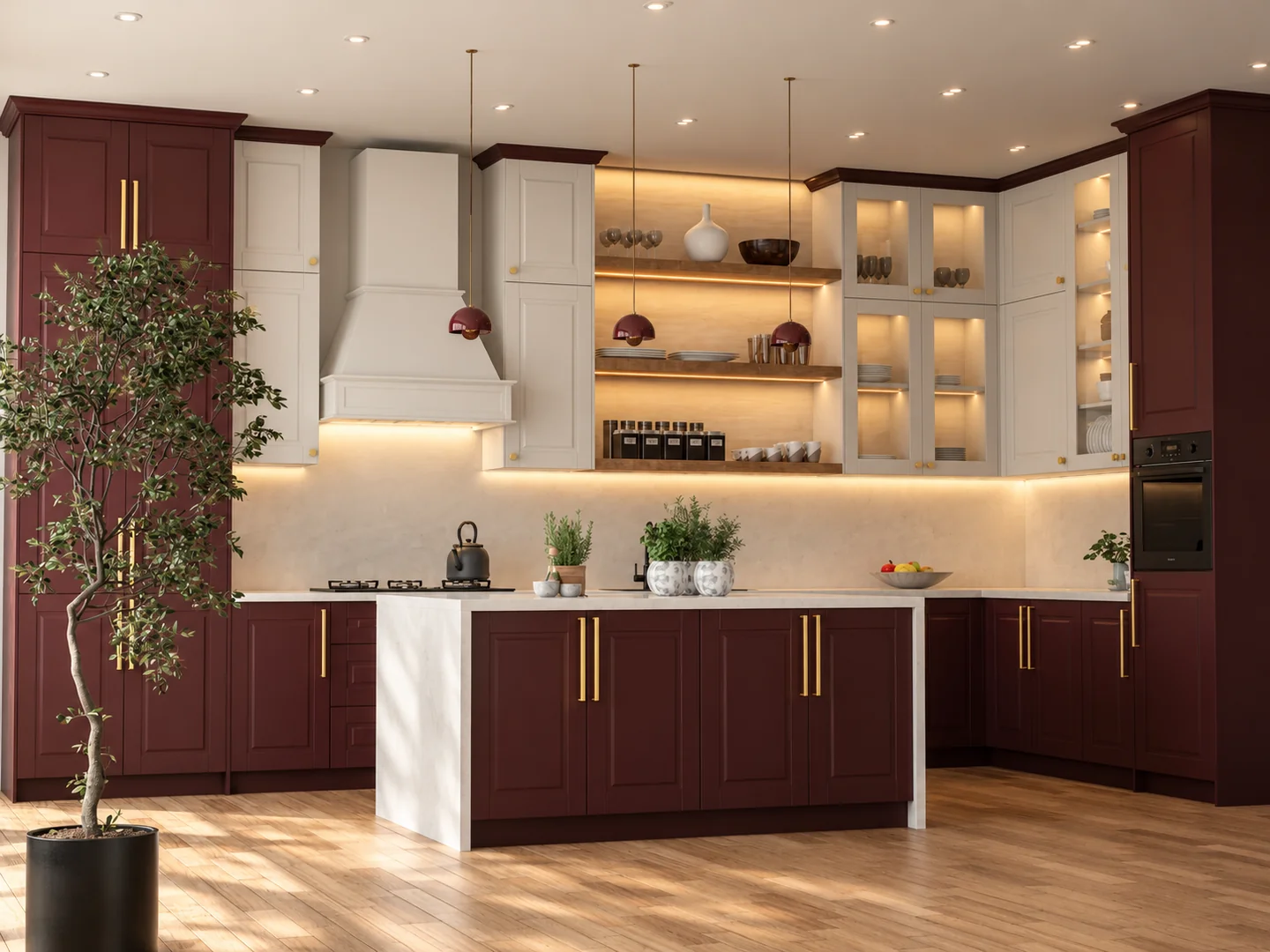 Deep red and cream kitchen with panelled doors, brass handles and a stone island.